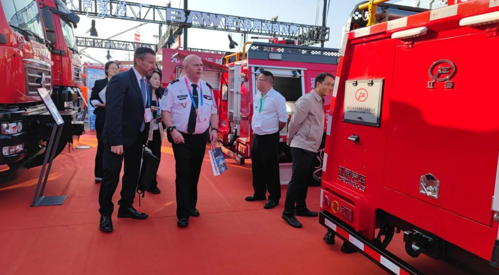 Visitors inspecting Jiangte vehicles